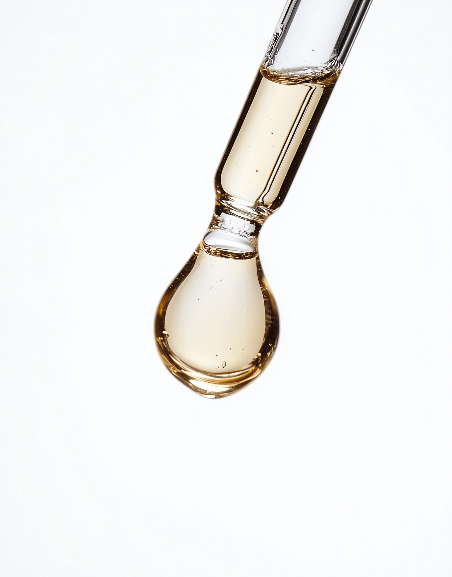 Triextract dropper with golden liquid, showcasing the essence of Chaga, Reishi, and Lion's Mane mushrooms.