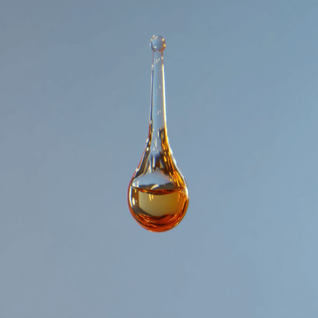Amber liquid droplet in a glass dropper against a light blue background